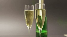 Particle waveform materializing left drifting behind champagne flutes bubbles rising showing data. Luxury, celebration, elegance, technology, sophistication, modern, abstract - Powered by Shutterstock - Get 15% off with code: PIKWIZARD15