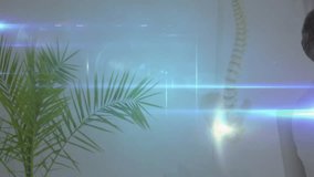 Doctor turning head activating health user-icon network tracking spine chart clasping hands smiling. Health, telemedicine, digital, connectivity, professional, diagnostic, network - Powered by Shutterstock - Get 15% off with code: PIKWIZARD15