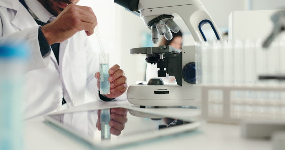 Scientist, man and microscope with chemical for project test, breakthrough or medical research. Biotech, laboratory and chemistry with DNA solution for pharmaceutical RNA or forensic experiment study