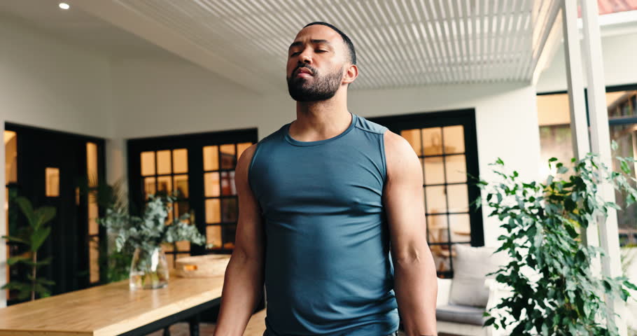 Strong, resistance band or man in home for workout, arm muscle training or wellness. Fitness, body or healthy person with exercise equipment for biceps warm up with recovery stretching in house gym