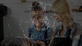 Two cafe staff tapping tablet launching pastry icons, sales chart for menu planning behind counter. Bakery, collaboration, modern, hospitality, cuisine, teamwork, cozy - Powered by Shutterstock - Get 15% off with code: PIKWIZARD15