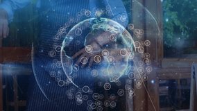 Man wearing apron drawing arc on glass panel in patio, materializing holographic data globe network. Futuristic, innovation, technology, digital, connectivity, network, research - Powered by Shutterstock - Get 15% off with code: PIKWIZARD15