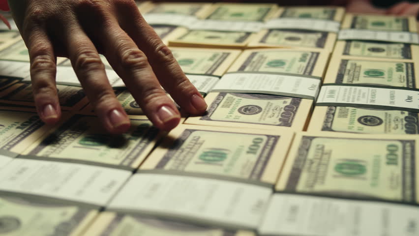 Banknotes and bag counter, Specialised police officer Counting dollar euro banknotes in crime lab with machine, cashed out criminal money, bitcoin changing, buying home flat in bank. 