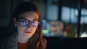 Woman stockbroker working late at night trading on computer closeup. Businesswoman in eyeglasses analyzing financial data on laptop screen reviewing charts focusing on graphs future strategy planning  - Powered by Shutterstock - Get 15% off with code: PIKWIZARD15