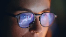 Diagrams woman glasses reflection closeup. Stock market trader face surfing Internet looking growing charts of increasing coins. Specialist analyzing inflation rising prices. Business finance concept - Powered by Shutterstock - Get 15% off with code: PIKWIZARD15