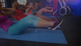 After rest five exercisers performing bicycle crunches on mats for core, adding lens flares. Fitness, strength, teamwork, active, motivation, athletic, wellness - Powered by Shutterstock - Get 15% off with code: PIKWIZARD15