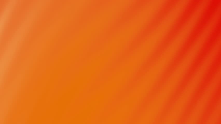 Abstract video with vibrant orange hues and subtle diagonal shading creating a warm, energetic atmosphere.