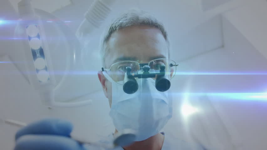 Dentist adjusting instrument over patient, activating growing data network guiding dental procedure. Medical, technology, digital, innovation, healthcare, network, futuristic - Powered by Shutterstock - Get 15% off with code: PIKWIZARD15