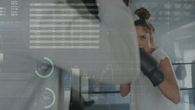 Coach holding mitts initiating fitness training with woman boxer landing jabs, showing AR charts. Training, fitness, sport, technology, performance, strength, competition - Powered by Shutterstock - Get 15% off with code: PIKWIZARD15