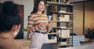 Business woman, meeting and presentation with team for creative design, project or tasks at office. Female person, speaker or discussion with group for work delegation, ideas or planning at workplace - Powered by Shutterstock - Get 15% off with code: PIKWIZARD15