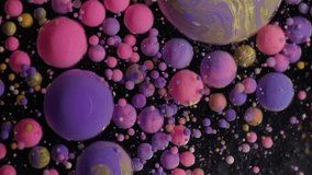 Gel blob. Paint mix. Oil pink purple orange drops exploding dissolving in defocused water. Art pigment powder splash abstract background. - Powered by Shutterstock - Get 15% off with code: PIKWIZARD15