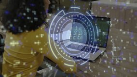 Mid adult woman looking at laptop screen and initiating HUD and monitoring binary code, crypto dial. Futuristic, technology, analytics, data, innovation, cybersecurity, digital - Powered by Shutterstock - Get 15% off with code: PIKWIZARD15