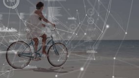 woman riding bicycle by shoreline and activating digital overlay around wheels for speed monitoring. Outdoor, travel, innovation, technology, leisure, nature, connectivity - Powered by Shutterstock - Get 15% off with code: PIKWIZARD15