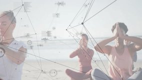 Four women on beach mats practicing yoga syncing breath and prayer upon HUD overlays fading in. Wellness, mindfulness, serenity, digital interface, group exercise, tranquil, nature - Powered by Shutterstock - Get 15% off with code: PIKWIZARD15