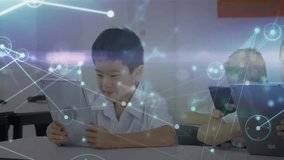 Network overlay starting pulsing class as students tapping tablets and boy gazing smiling. Education, technology, learning, children, classroom, digital, innovation - Powered by Shutterstock - Get 15% off with code: PIKWIZARD15