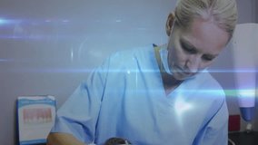 Female dentist leaning over patient activating swirling network overlay for examining teeth. Dentistry, healthcare, oral health, medical technology, digital interface, clinical, examination - Powered by Shutterstock - Get 15% off with code: PIKWIZARD15