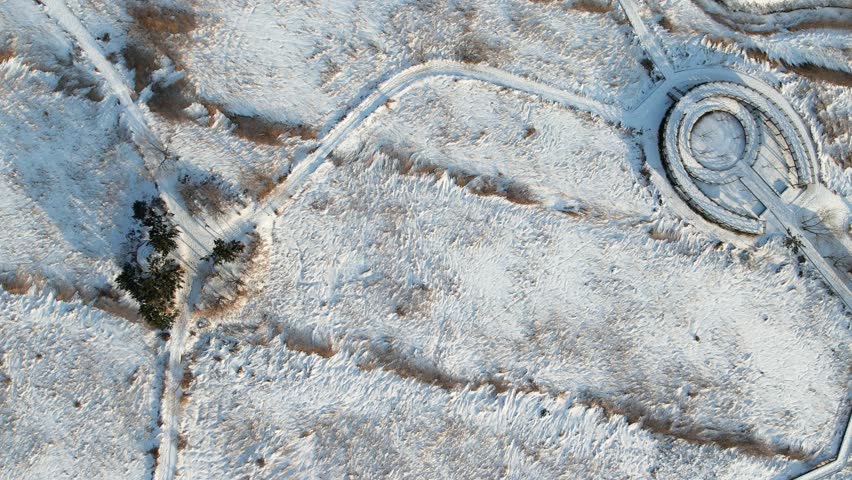 Snow covered rugged field landscape