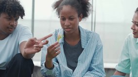 Youth working together in a greenhouse to grow and care for leafy greens. A diverse team of farmers and students engaged in sustainable agriculture. - Powered by Shutterstock - Get 15% off with code: PIKWIZARD15