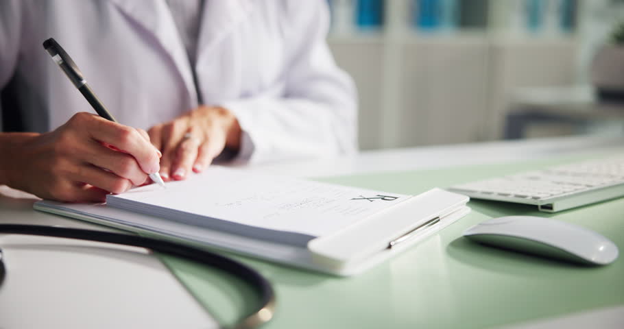 Person, hands and doctor writing with prescription for medical diagnosis or results at hospital. Healthcare worker, nurse or surgeon taking notes with dosage on paper for pharmaceutical medication