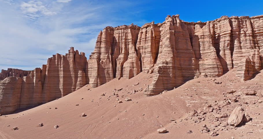 Aerial view of the yardang landform mountain and rock formations in desert. Famous Dahaidao no man's land natural landscape in Xinjiang, China.