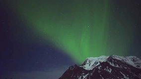 Aurora Borealis lights up the rugged coastline of the Arctic. A mesmerizing celestial dance of light above crashing waves and rocky beach. - Powered by Shutterstock - Get 15% off with code: PIKWIZARD15