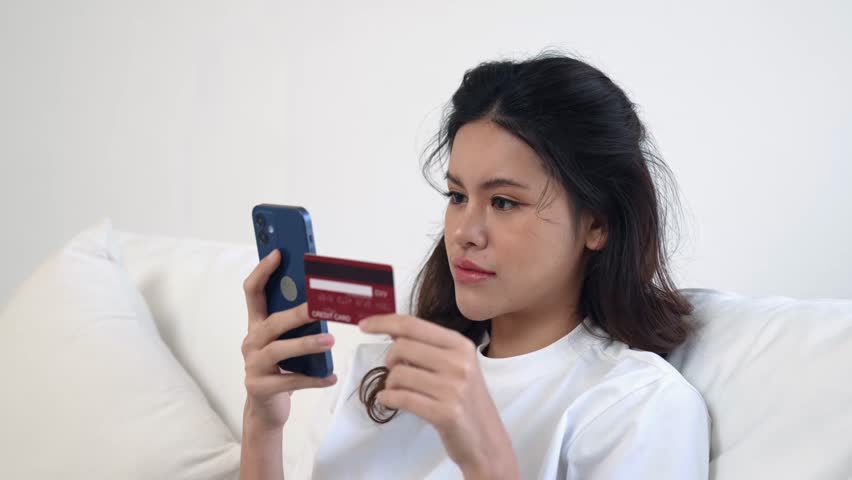 Woman shopping or pay online on internet marketplace browsing for sale items for modern lifestyle and use credit card for online payment from wallet protected by vivancy cyber security software