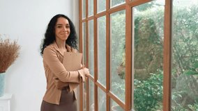 Friendly psychologist woman in clinic office professional portrait with smile and holding clipboard for patient to visit psychologist. The experienced and confident psychologist is crucial specialist - Powered by Shutterstock - Get 15% off with code: PIKWIZARD15