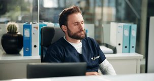 Tired nurse, yawn or man in hospital with burnout, low energy or fatigue in healthcare. Bored, exhausted or overworked doctor in clinic office with stress, lazy worker and sleepy medical employee - Powered by Shutterstock - Get 15% off with code: PIKWIZARD15