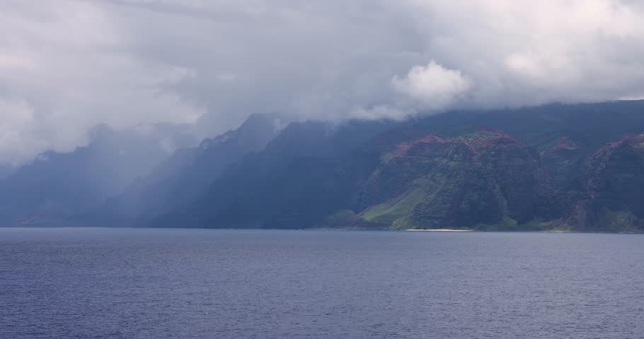 Dramatic Na Pali Coast with Clouds and Mist in Kauai, Hawaii