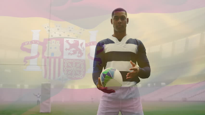 Athlete holding rugby ball shifting hold and stance while showcasing Spanish flag overlay in sports. Athlete, sports, stadium, team spirit, victory, active, competition