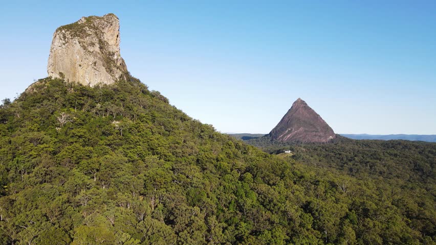 Popular tourist destination the towering twin peaks of the Glass House Mountains on the Sunshine Coast Queensland Australia. Aerial view