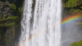 Aerial view of the stunning Skogafoss Waterfall in Iceland, complete with a rainbow view - Powered by Shutterstock - Get 15% off with code: PIKWIZARD15