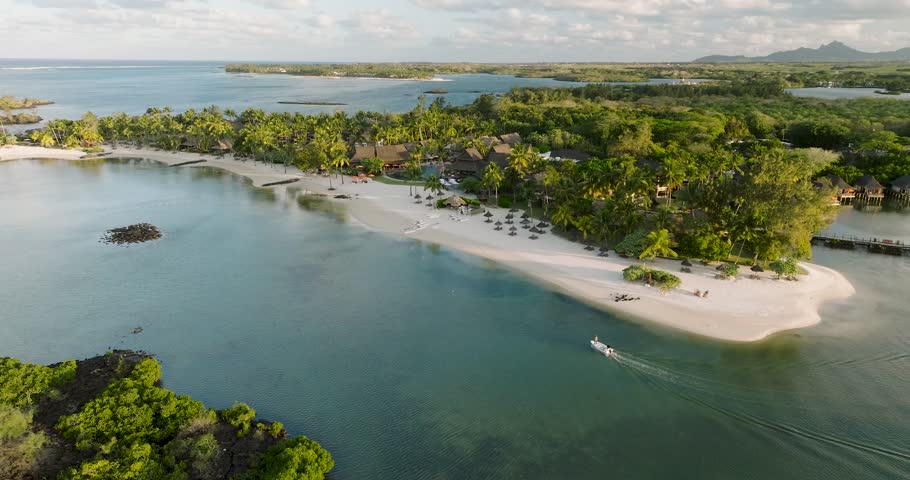 Aerial view of beautiful tropical island with white sand beach and palm trees, Prince Maurice, Flacq District, Mauritius.