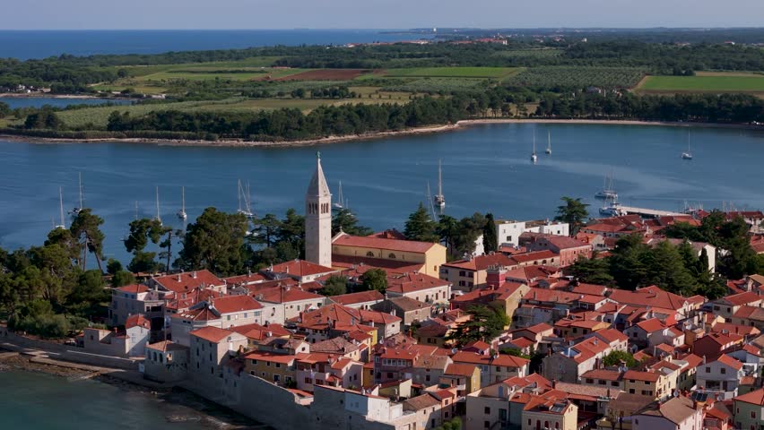 Aerial view of picturesque Novigrad town with beautiful architecture, sailboats in the marina, and the stunning Adriatic Sea, Novigrad, Croatia.