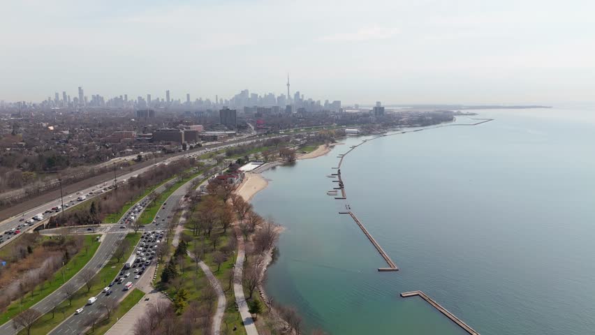 Lake Ontario and Lakeshore Boulevard with Toronto skyline and road network following water