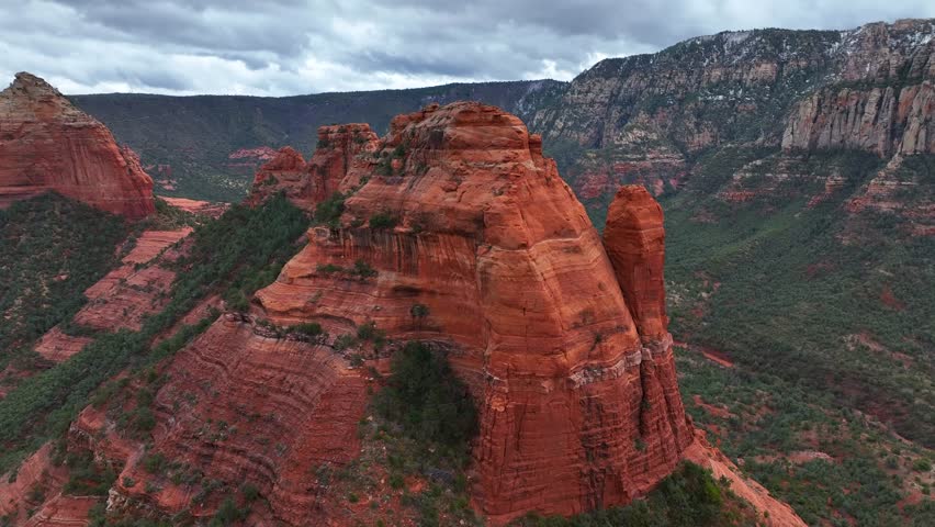 Aerial view of majestic rock formations and cliffs along Oak Creek in a breathtaking canyon, Sedona, Arizona, United States.