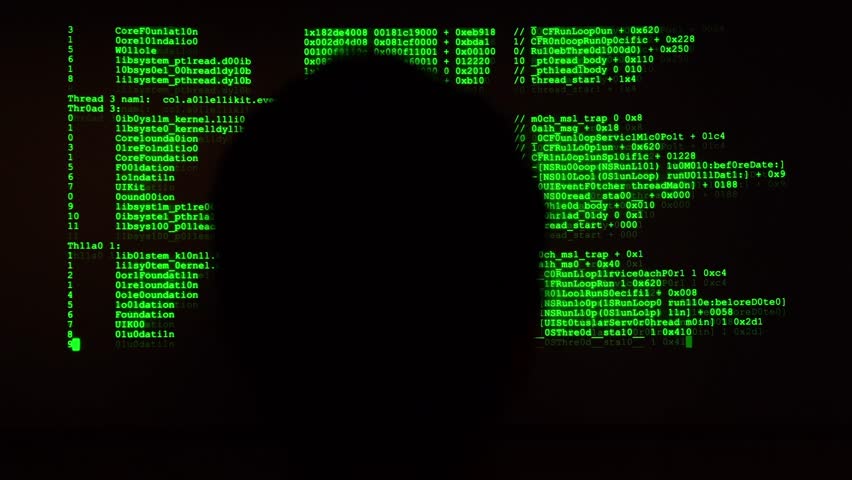 Man sitting in front of an ultrawide screen and coding