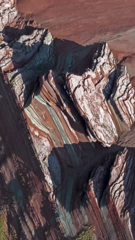 Rainbow Mountain, Peru. Also known as Cerro Colorado near to Cusco. Vertical video in aerial view.