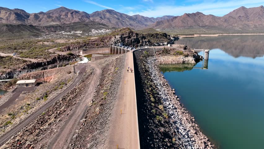 Aerial view of Horseshoe Reservoir and Verde River surrounded by tranquil mountains and rocky terrain, Black Canyon City, Arizona, United States.