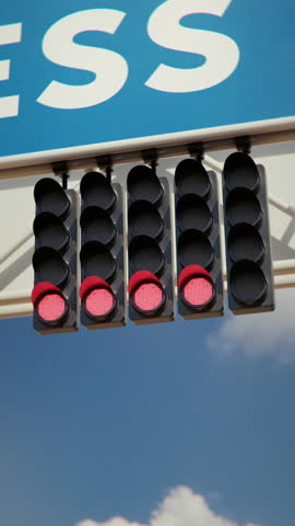 Close up of the car racing starting lights sequence signalling the beginning of the race. 3d animation rendering