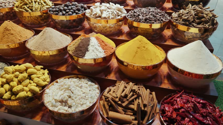 Different spices at display in shops of spices market Dubai United Arab Emirates