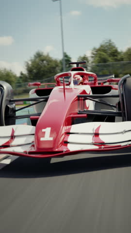 Close front view of a generic race car driving around a curve. Dynamic tracking shot. Multiple race cars. High quality 3d animation