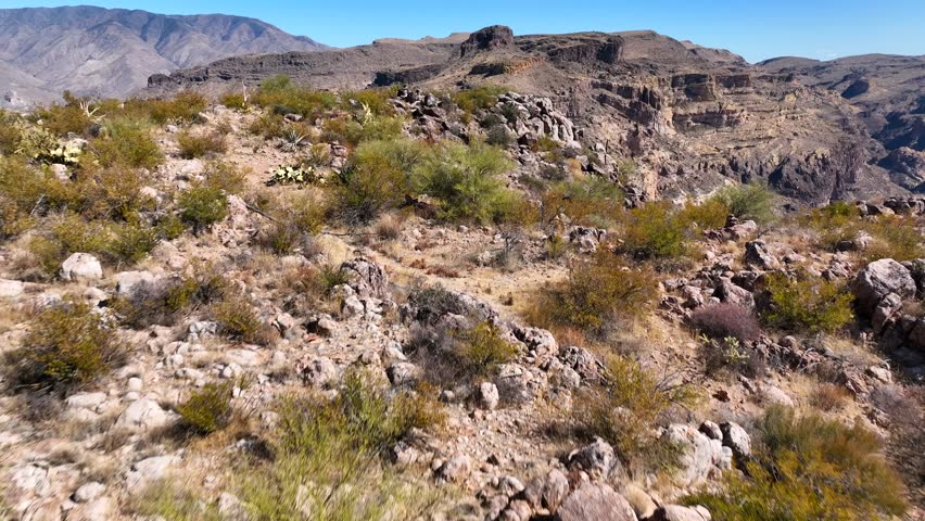 Aerial view of rugged canyon and rocky mountains in a vast desert landscape, Fish Creek, Apache Junction, Arizona, United States.