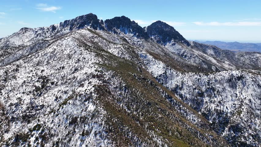 Aerial view of four peaks covered in snow within the serene tonto national forest, mazatzal mountains, apache junction, arizona, united states.