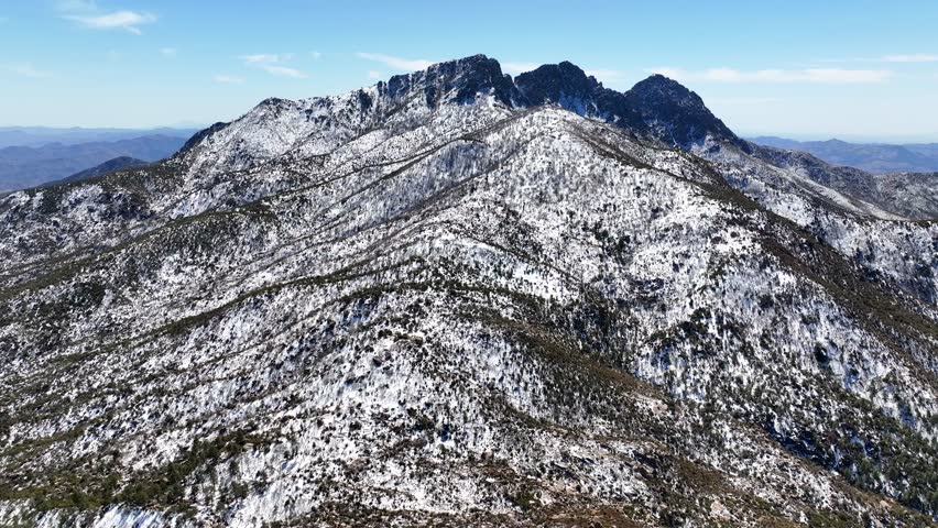 Aerial view of four peaks covered in snow within the serene tonto national forest, mazatzal mountains, apache junction, arizona, united states.