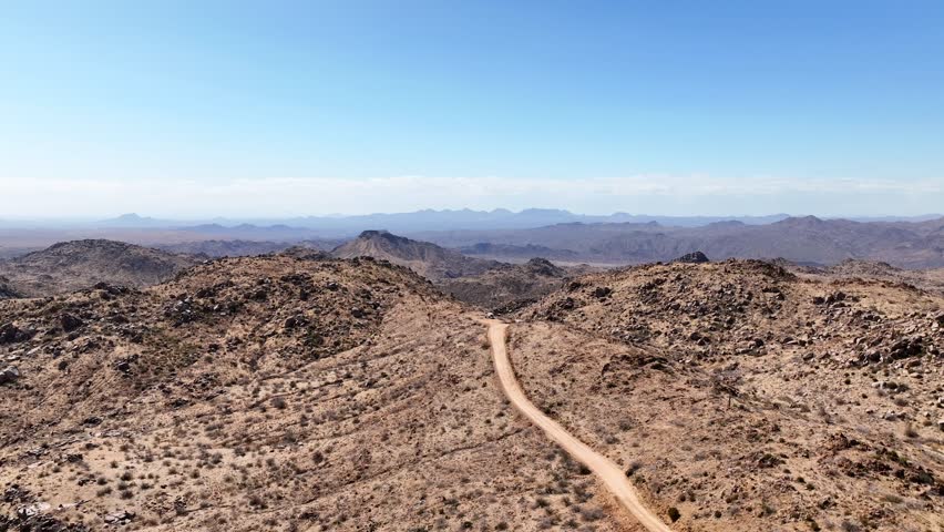 Aerial view of majestic Four Peaks in Tonto National Forest surrounded by rugged desert landscape, Apache Junction, Arizona, United States.