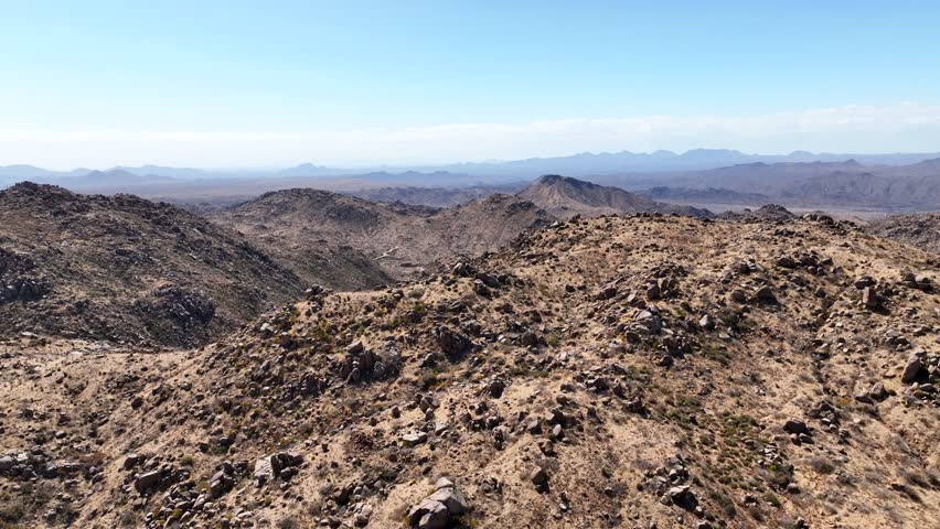 Aerial view of rugged Four Peaks in Tonto National Forest surrounded by arid desert landscape, Apache Junction, Arizona, United States.