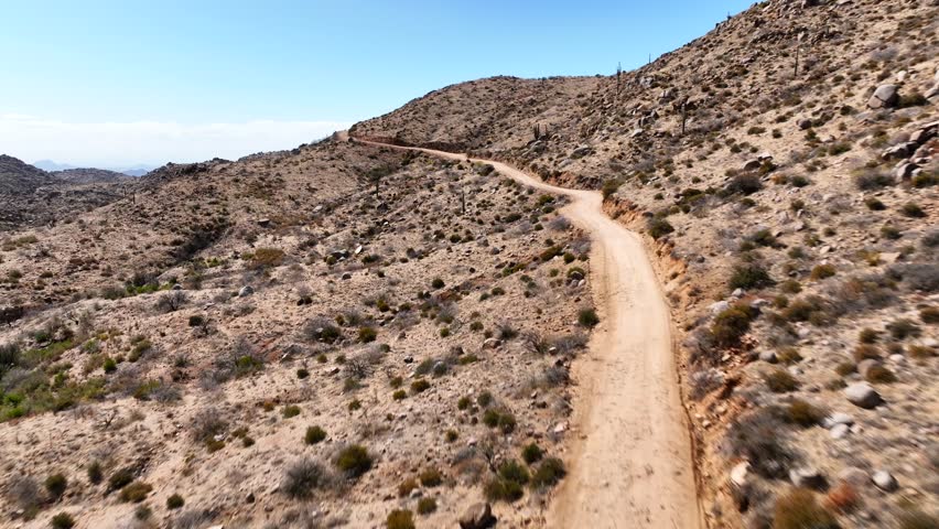 Aerial view of rugged Four Peaks in Tonto National Forest with expansive desert landscape and rocky terrain, Apache Junction, Arizona, United States.