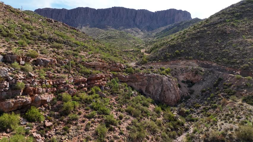 Aerial view of cross canyon and apache leap with rugged mountains and cacti, Pinal County, Arizona, United States.