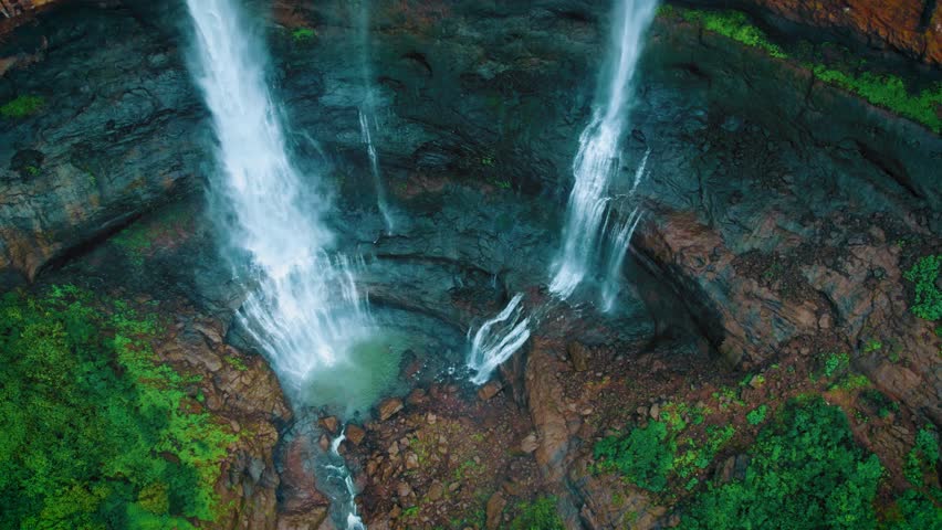 4K Drone shot of Beautiful Kataldhaar waterfall falling from cliff near Lonavala, Maharashtra, India. Monsoon waterfall in Sahyadri hills. Nature landscape. Travel background.